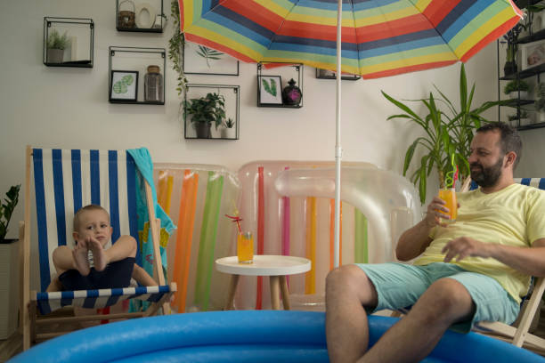 istock Family spending vacation at home 1329203413