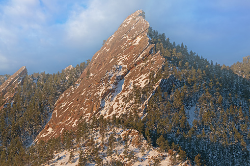 Winter landscape of the snow flocked Flatirons, Front Range, Rocky Mountains, Boulder, Colorado, USA