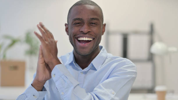 istock Portrait of African Man Clapping in Office, Applaud 1329207358