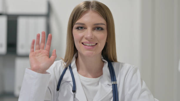 istock Female Doctor Talking on Video Chat 1329207405