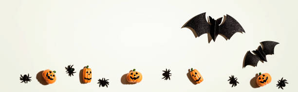 istock Halloween paper bats and small pumpkin ghosts 1329209903