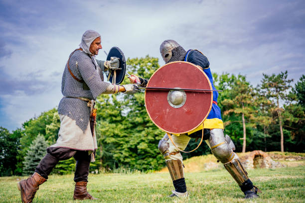 istock Two knight fighting on the battlefield 1329210492
