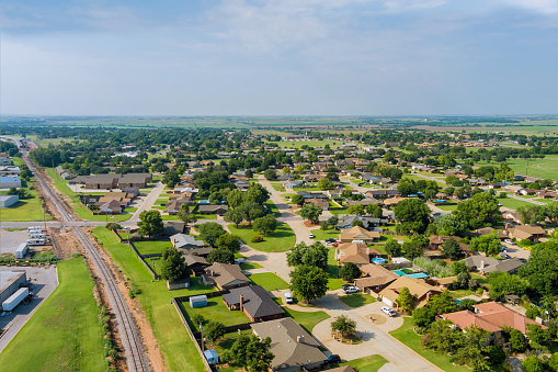 Panorama landscape scenic aerial view of a suburban settlement in a beautiful detached houses the Clinton town Oklahoma US