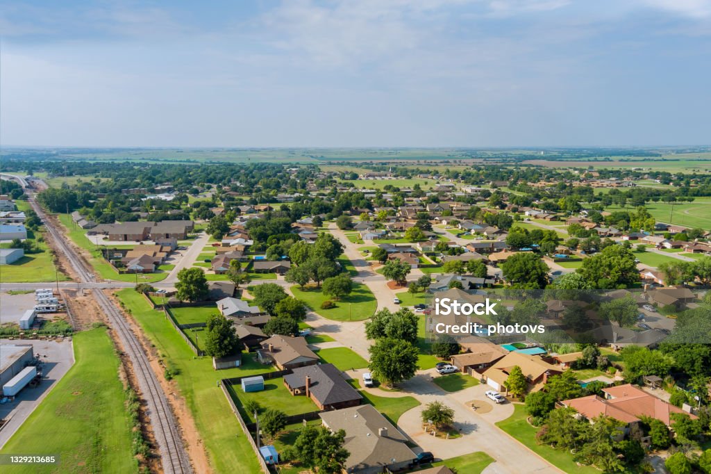 Panorama landscape scenic aerial view of a suburban settlement in a beautiful detached houses the Clinton town Oklahoma USA Panorama landscape scenic aerial view of a suburban settlement in a beautiful detached houses the Clinton town Oklahoma US Oklahoma Stock Photo