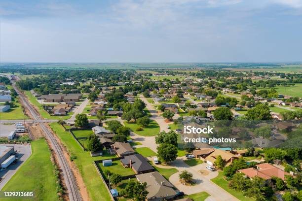 Panorama Landscape Scenic Aerial View Of A Suburban Settlement In A Beautiful Detached Houses The Clinton Town Oklahoma Usa Stock Photo - Download Image Now