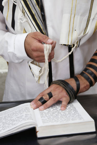 An jewish man is reading his bible and praying An jewish man is reading his bible and praying hasidism photos stock pictures, royalty-free photos & images