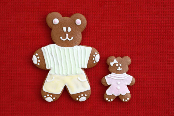 istock Happy father and daughter - gingerbread bears 1329225926