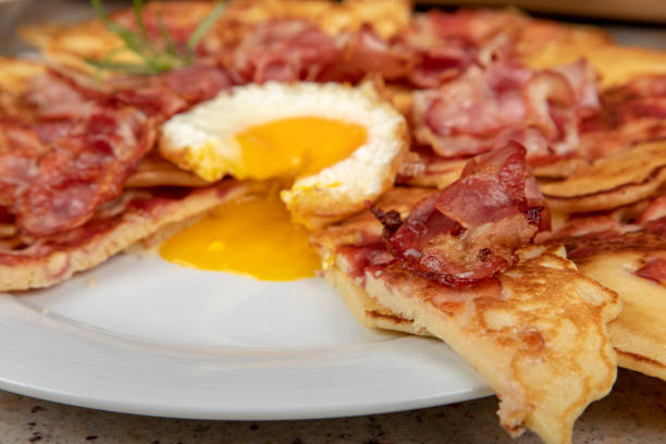 istock Plate of pancakes with bacon. 1329232721