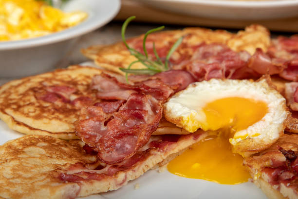 istock Plate of pancakes with bacon. 1329233475