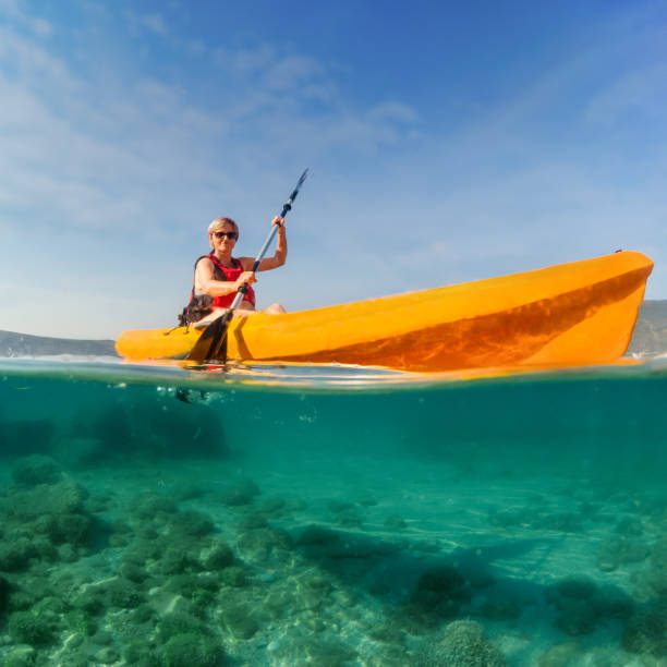 Woman on the kayak stock photo