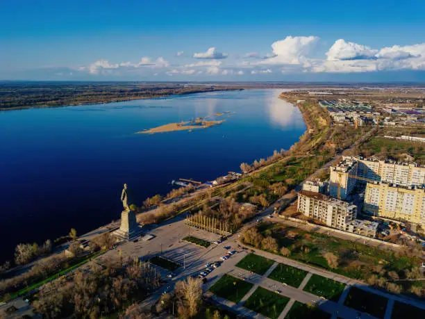 Evening spring Volgograd cityscape at sunset, aerial view.