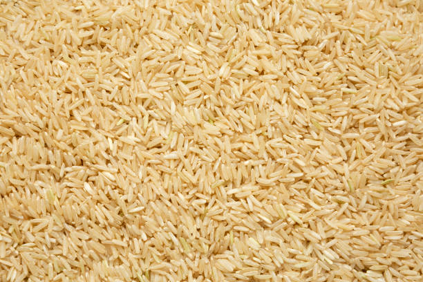 istock Dry Brown Rice background, top view. Overhead, from above, flat lay. 1329244751
