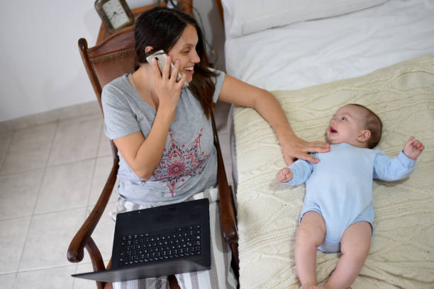 istock mother with her baby in the room 1329247702