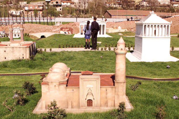 Alaaddin Mosque of Nigde at the Miniaturk miniature park Istanbul, Turkey - April 30: Alaaddin Mosque of Nigde at the Miniaturk miniature park on Golden Horn on April 30, 2005 in Istanbul, Turkey. Miniaturk is one of the world's largest miniature parks. niğde city stock pictures, royalty-free photos & images