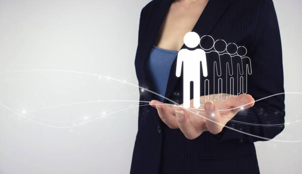 istock Marketing Segmentation And Leader concept. Hand hold digital hologram people on grey background. Chief Executive Officer 1329247881