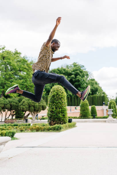 istock afro american young stylish man in park 1329251252