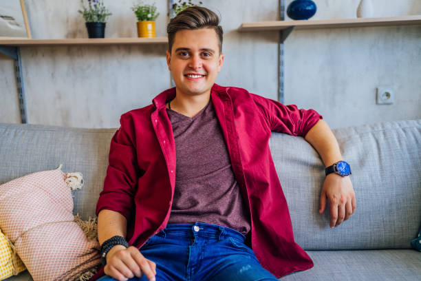 istock Portrait of young smiling man 1329257713