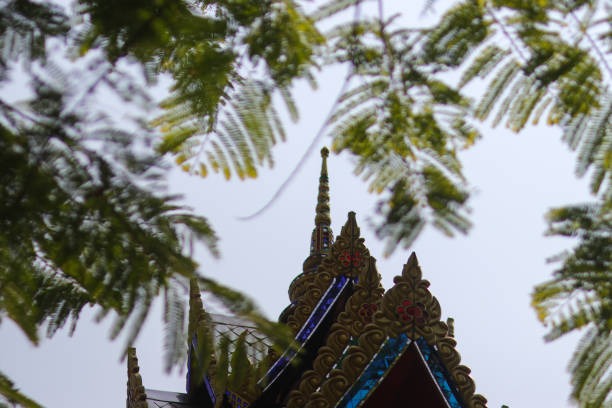 A detail of a corner of ornamental temple building at Thailand Buddhism Shrine Nam Hai Kwan Se Im Pu Sa Vihara Sukabumi, Indonesia.