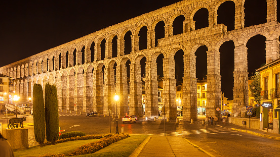 Segovia, Spain - September 21, 2015: Ancient roman aqueduct in Segovia at night. Cityscape, panoramic view