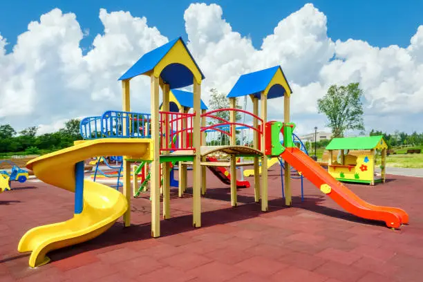 Colorful playground empty. Outdoor playground set. Modern children playground equipment exercise kid. Area for play yard children slide park equipment. Elementary school yard kindergarten. Play ground