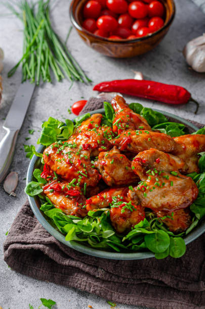 istock Delicious hot wings with chilli and garlic 1329274901