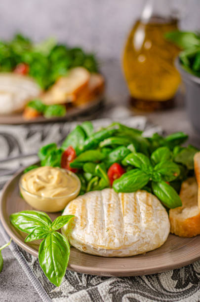 Fresh salad with grilled camembert and dijon mustard