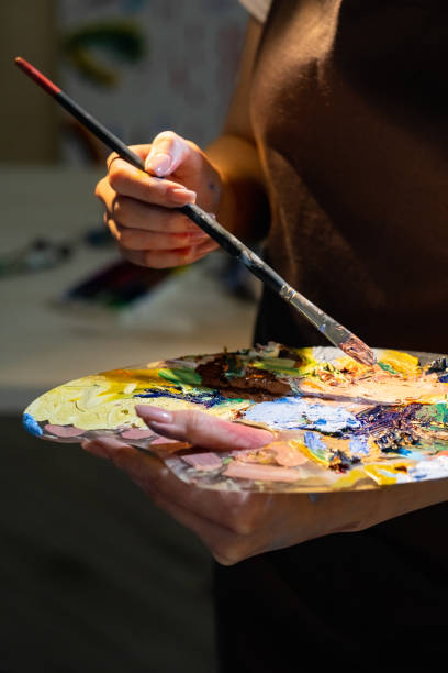 istock painting school female master class artistic hobby 1329276985