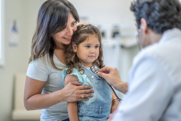istock Mother and daughter go to doctor's appointment 1329277279