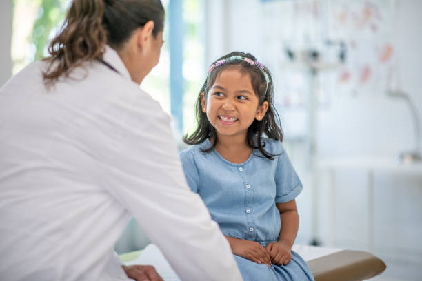 istock Child visits doctor 1329277431