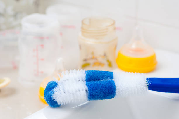 istock Washing baby bottles and nipples 1329278505