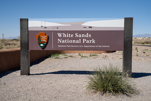 New Mexico, USA - May 8, 2021: Entrance sign for White Sands National Park on a sunny day