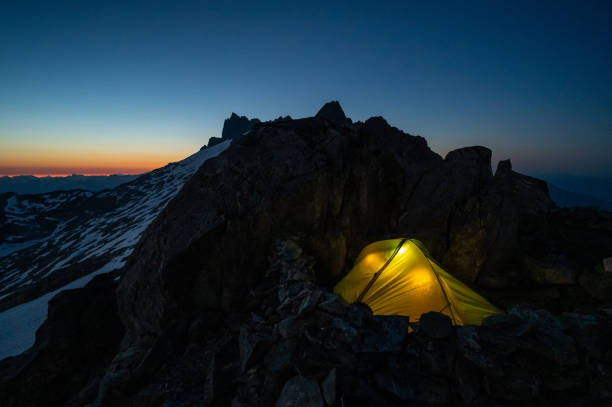 istock Tent on a mountain top at dusk 1329282630