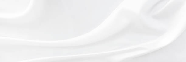 istock White gray satin texture that is white silver fabric silk panoramic background with beautiful soft blur pattern natural. 1329285656