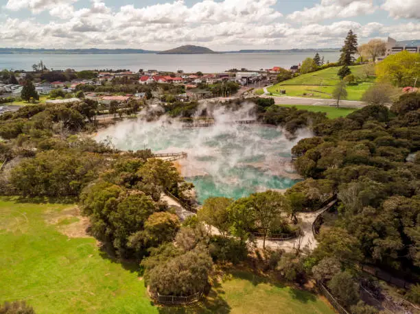 Photo of Aerial view of big hot spring located in Kuirau Park in the city of Rotorua, New Zealand. Geothermal activity