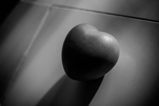 istock Heart shape dark black and white. 1329300651