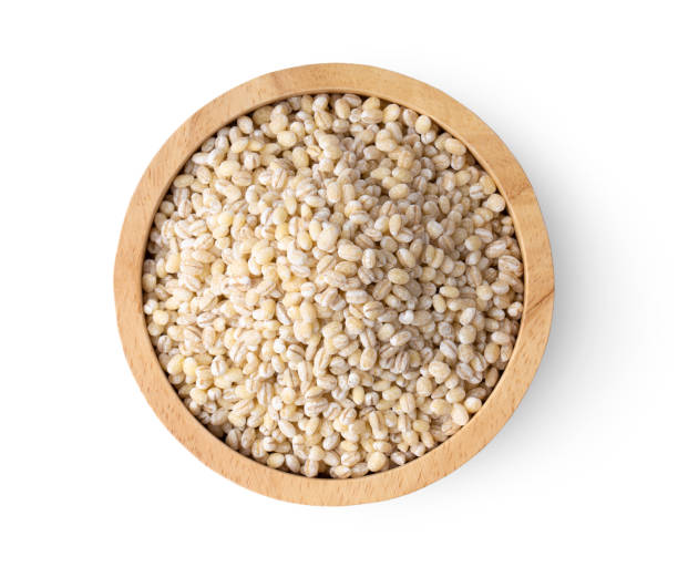 istock pile of pearl barley on white background 1329303178