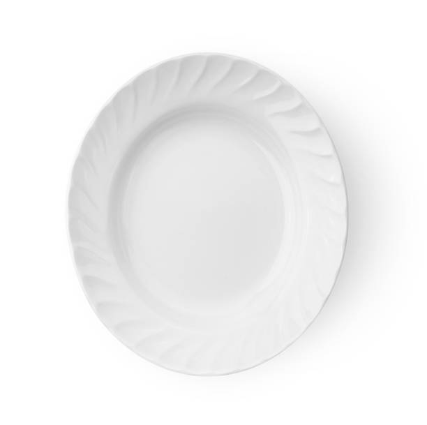 istock white ceramics plate on white background top view 1329303221