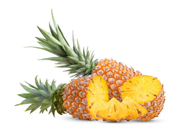 istock pineapple slices isolated on the white 1329304924