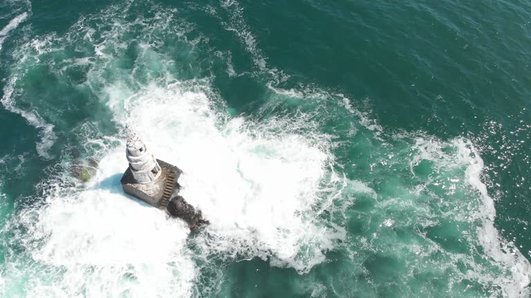 Dynamic 4K Aerial Drone Shot of  Lighthouse in the sea