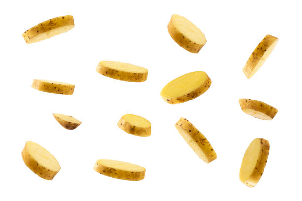 istock raw potatoes flying isolated on white background 1329315608
