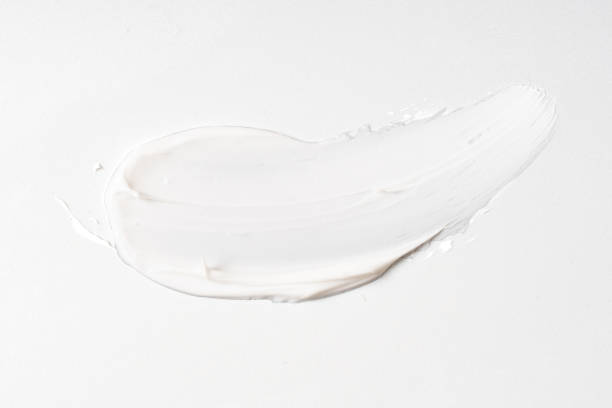 istock white cosmetic face cream texture on white background 1329315613