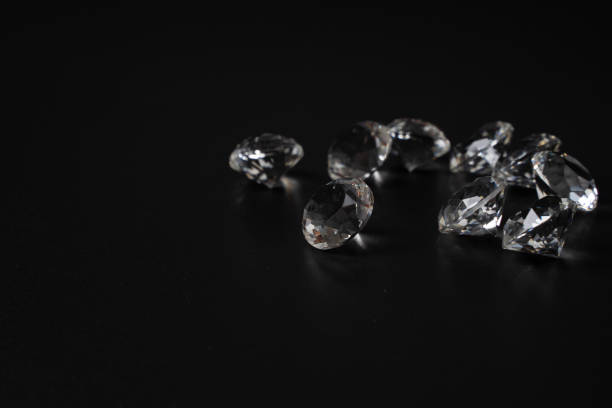 istock luxury diamonds on black backgrounds 1329315630
