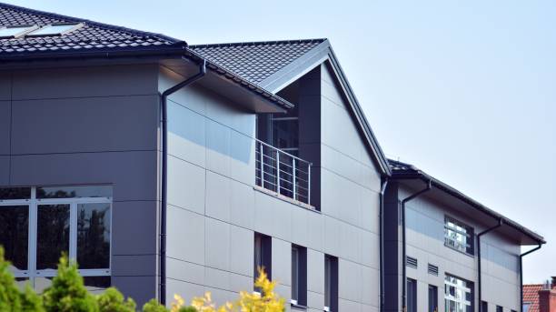 istock The glazed facade of an office building with reflected sky. 1329317800