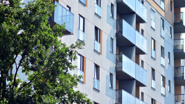 istock Eco architecture. Green tree and apartment building. 1329318605