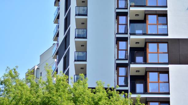 istock Eco architecture. Green tree and apartment building. 1329318699