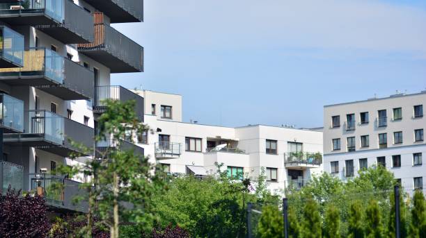 istock Eco architecture. Green tree and apartment building. 1329318878