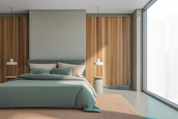 istock Wooden and olive panoramic master bedroom interior design 1329320160