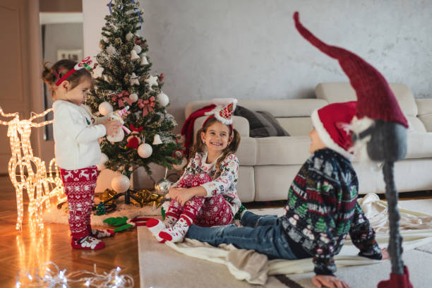 istock Happy children on Christmas Eve 1329326832
