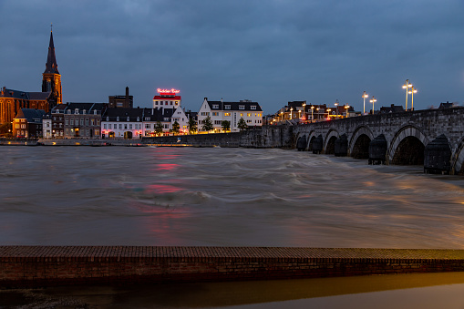 Maastricht, Netherlands 07-16-2021 long night exposure of the floods in downtown Maastricht and the historical centre next to the Meuse after heavy rain with over 150mm of rain in less than 24 hours