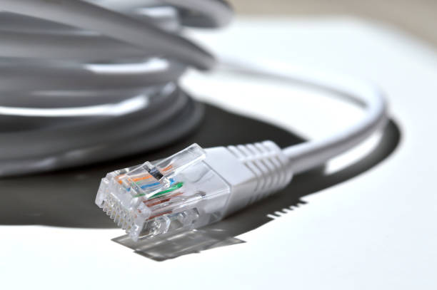 istock Twisted Lan wire with connector rj 45. close-up. 1329329985
